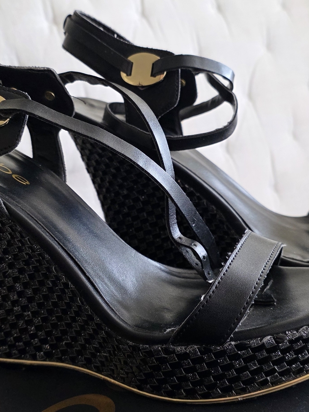 bebe Black Strappy Wedge Sandals with Gold Accent